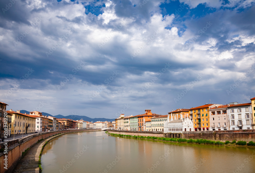 Pisa cityscape with Arno River embankment and Santa Maria della Spina church Tuscany Italy
