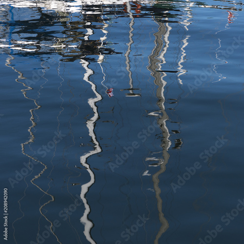 Reflection of sailboat masts on water, Fisherman's Wharf, Inner Harbour, Victoria, Vancouver Island, British Columbia, Canada