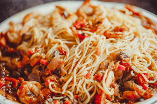 Angel Hair Pasta with tomato Sauce, Garlic and Shrimp.