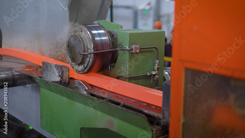 In the frame, red-hot metal on the rental line. The section of the future rolling is formed successively by special rollers.