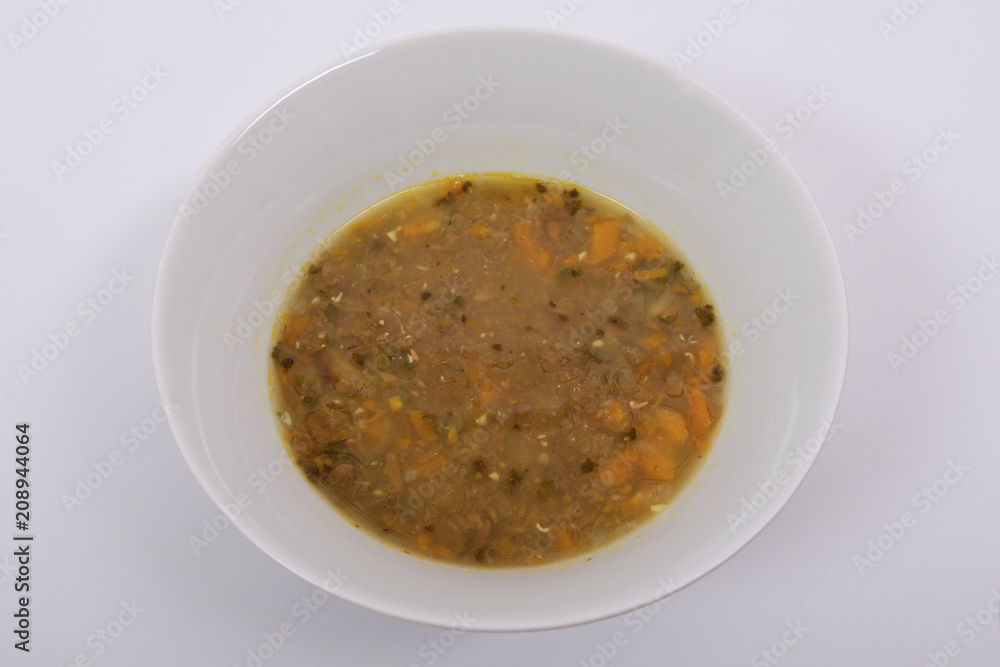 Lentil soup with carrot on a white Lentil soup with carrot on a white