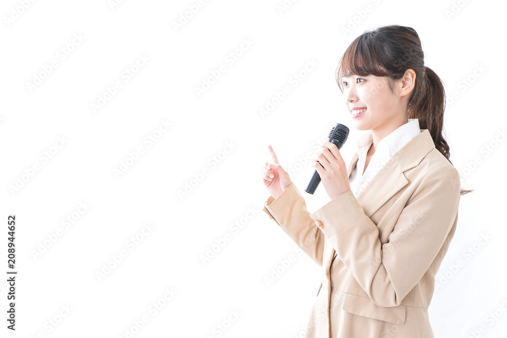 マイクで話す女性 マイクで話す女性
