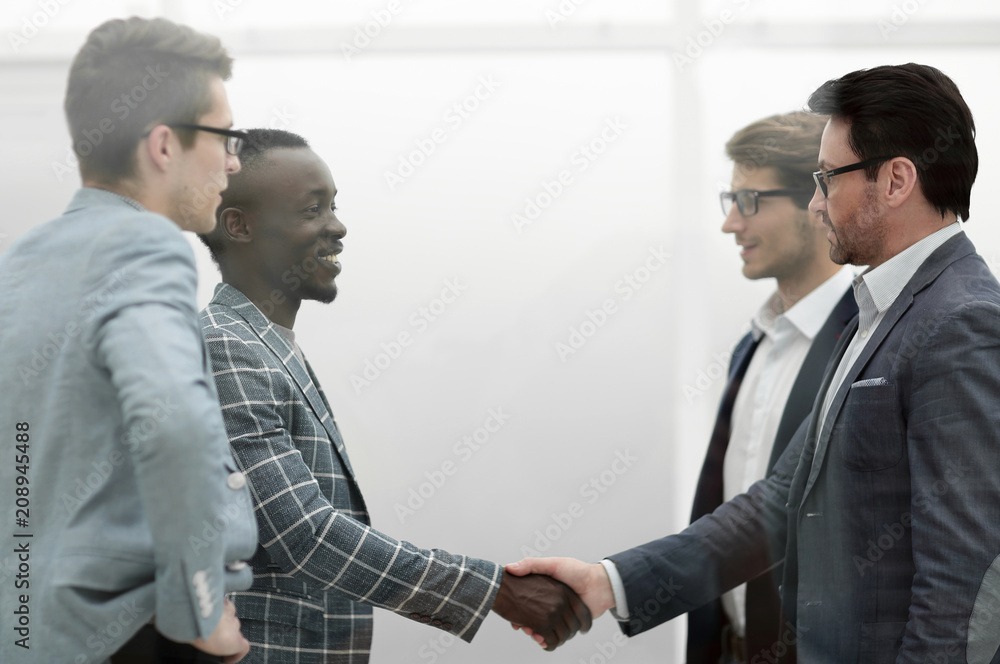 handshake of international business partners handshake of international business partners