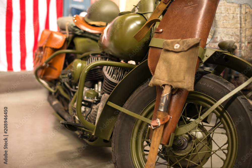 Retro military American motorcycle of protective color at the exhibition of retro cars in Ukraine, 2018.