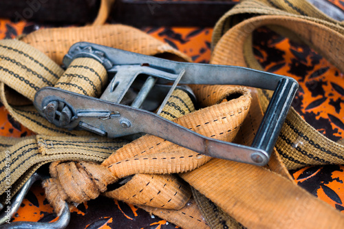 Photos Old clamping strap for cargo fixation, while transporting, witn iron buckle at t