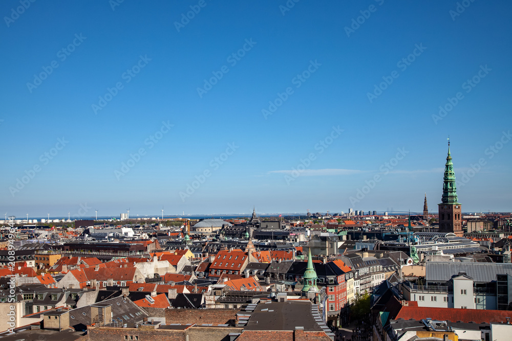 aerial view of beautiful cityscape with historical tower in copenhagen, denmark