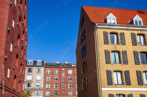 low angle view of beautiful historical buildings and blue sky, copenhagen, denmark