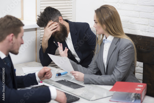 Wallpaper Mural Business colleagues at meeting, office background. Office atmosphere concept. Business negotiations, discuss working tasks. Lady manager tries to organize working process with colleagues in office Torontodigital.ca