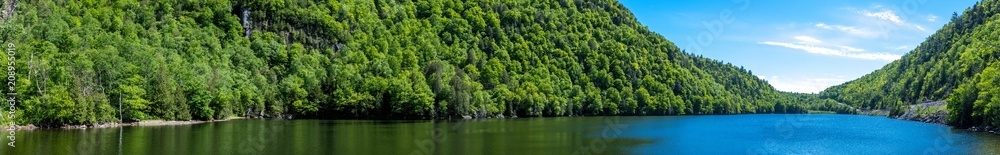 Panoramic view of a lake in the Adirondacks Mountains Panoramic view of a lake in the Adirondacks Mountains
