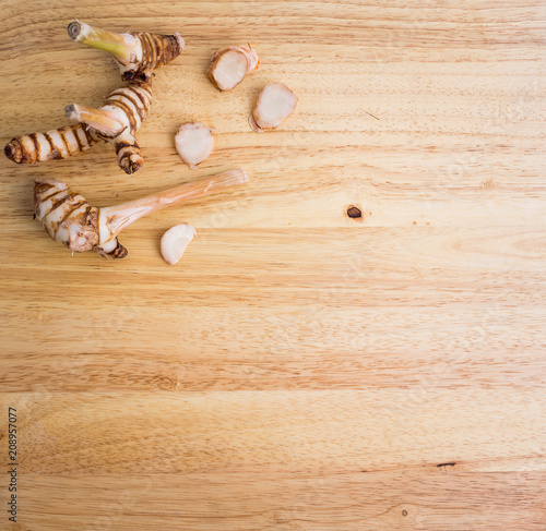 Galangal on wooden