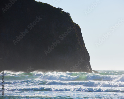 Wind blows the tops off the waves near Cape Meares, Tillamook County, Oregon photo