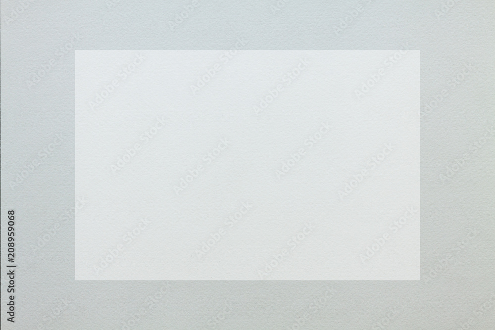 Gray handmade paper with a white rectangle as a mockup Gray handmade paper with a white rectangle as a mockup