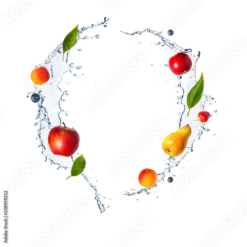 Splash with fruits, berries and fresh mint isolated on white