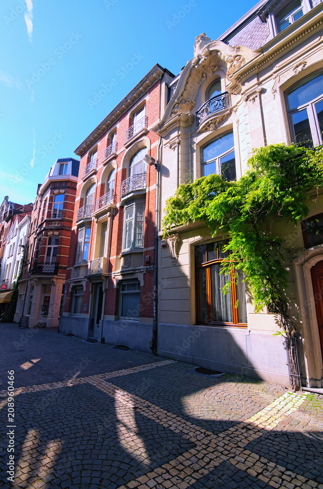 Antwerp, Belgium- MAY 02, 2018: A picturesque pedestrian street with traditional Flemish architecture. Historical part of Antwerp
