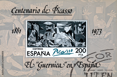 Stamp printed in Spain shows painting by Pablo Picasso Guernica photo