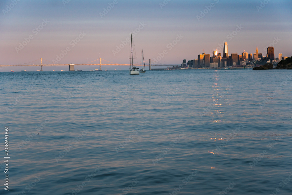 Sunset over San Francisco and the Bay Bridge as seen from Angel Island in the bay