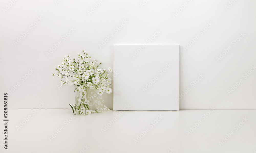 Square canvas mockup, white flowers, styled stock photo - obrazy, fototapety, plakaty 
