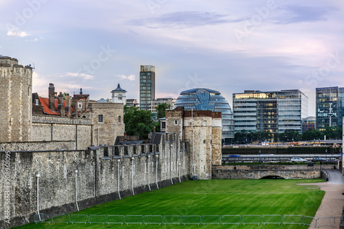 View of the fortress of the Tower of London with some modern building in the background. England