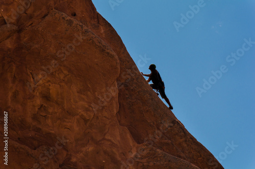 Man climbing mountain rock