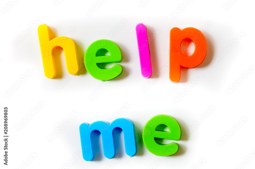 Magnetic letters on a fridge door spelling out Magnetic letters on a fridge door spelling out