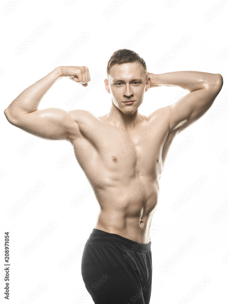 beautiful bodybuilder shows bicep on white background
