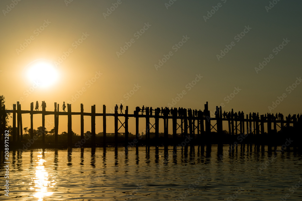 U Bein Bridge, Amarapura, Myanmar - view of this famous bridge during the sunset at Taung Tha Man Lake