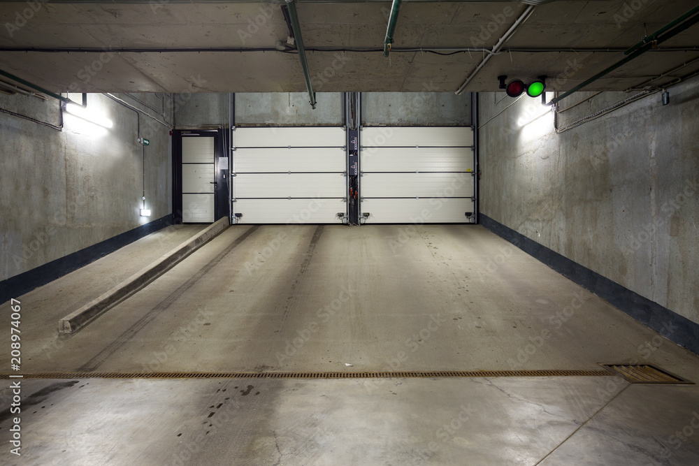 Underground car parking at modern house Underground car parking at modern house