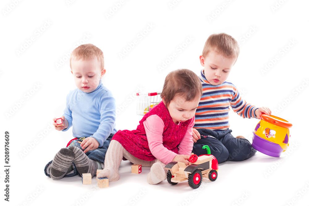 Three children play Three children play