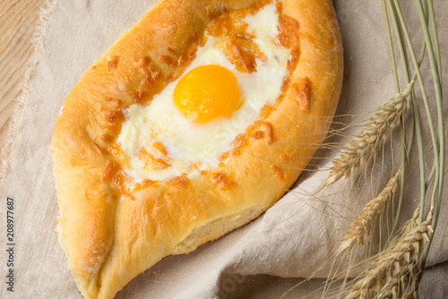 Khachapuri traditional Georgian cheese and egg-filled bread