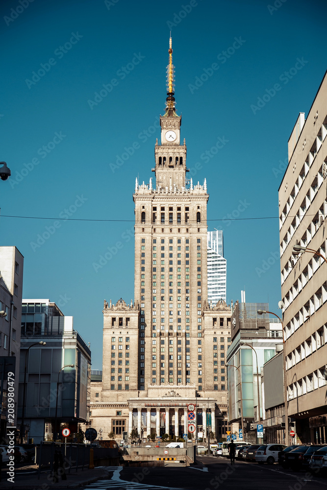 on the streets of Warsaw. The guy in the city center. Travel the European city. Stylishly dressed man with a briefcase in a hurry to work and study. The man travels to the cities of .Europe. Poland