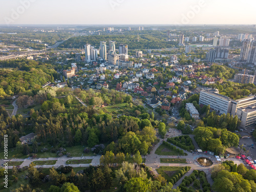 A bird's eye view, panoramic view from the drone to the view of the central alley of the Botanical Garden and the construction of the Pechersk district in the city of Kiev, Ukraine
