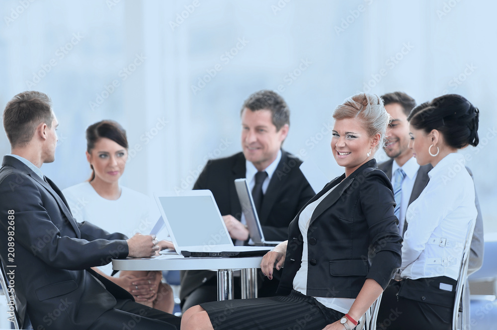 Business Team Discussing Ideas in Lounge Business Team Discussing Ideas in Lounge