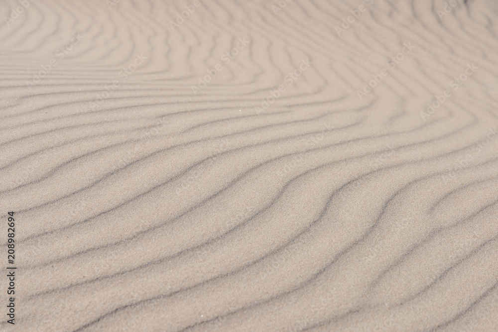 Interesting sand texture background, dunes, shadow play. Interesting sand texture background, dunes, shadow play.