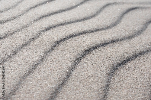 Interesting sand texture background, dunes, shadow play.