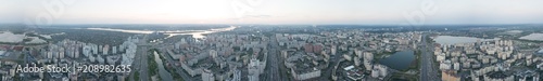 A bird's eye view, aerial panoramic view from drone to the Darnyts'kyi district of Kiev, Ukraine and the left bank of Dnieper.