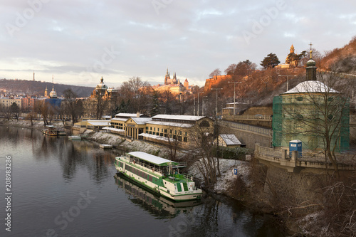 Wallpaper Mural Sunny snowy early morning Prague Lesser Town with gothic Castle above River Vltava, Czech republic Torontodigital.ca