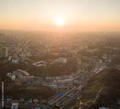 A bird's eye view, aerial view shooting from drone of the Podol district, oldest historical center of Kiev, Ukraine.