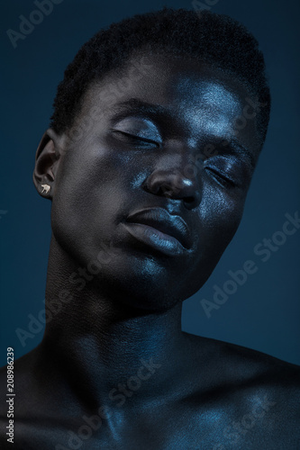 Portrait of man with eyes closed