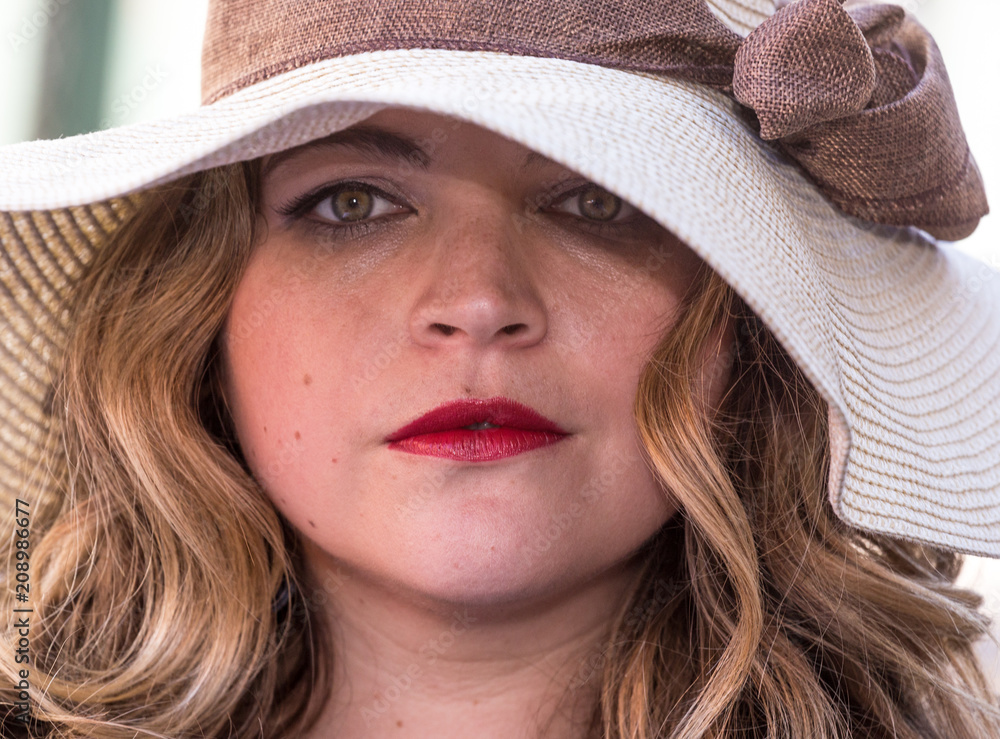 Beautiful woman with bright red lips in a hat Beautiful woman with bright red lips in a hat