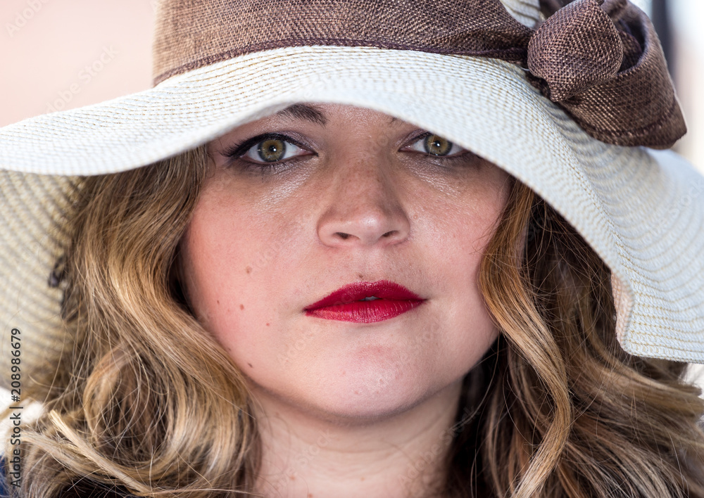 Beautiful woman with bright red lips in a hat Beautiful woman with bright red lips in a hat
