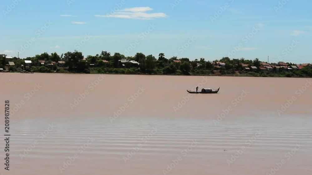 Fisherman On his Boat in Cambodia casting nets MF Fisherman On his Boat in Cambodia casting nets MF