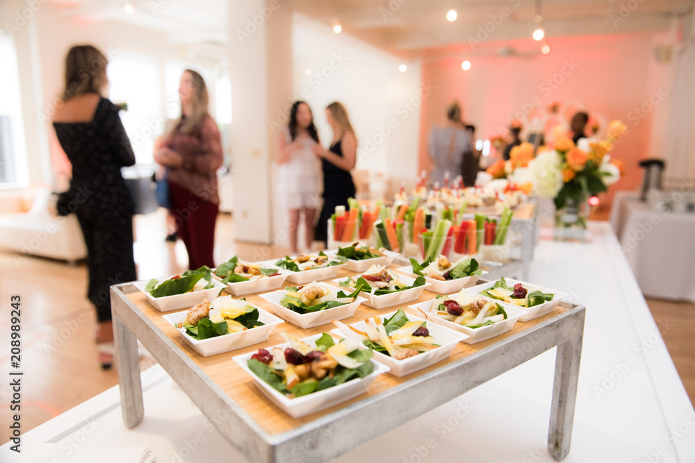 Healthy organic gluten-free delicious green snacks salads on catering table during corporate event party - obrazy, fototapety, plakaty 