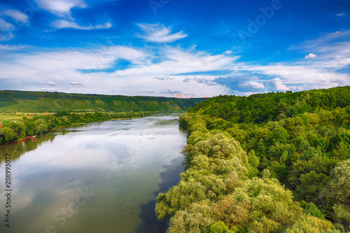 Beautiful clouds in the sky over the river