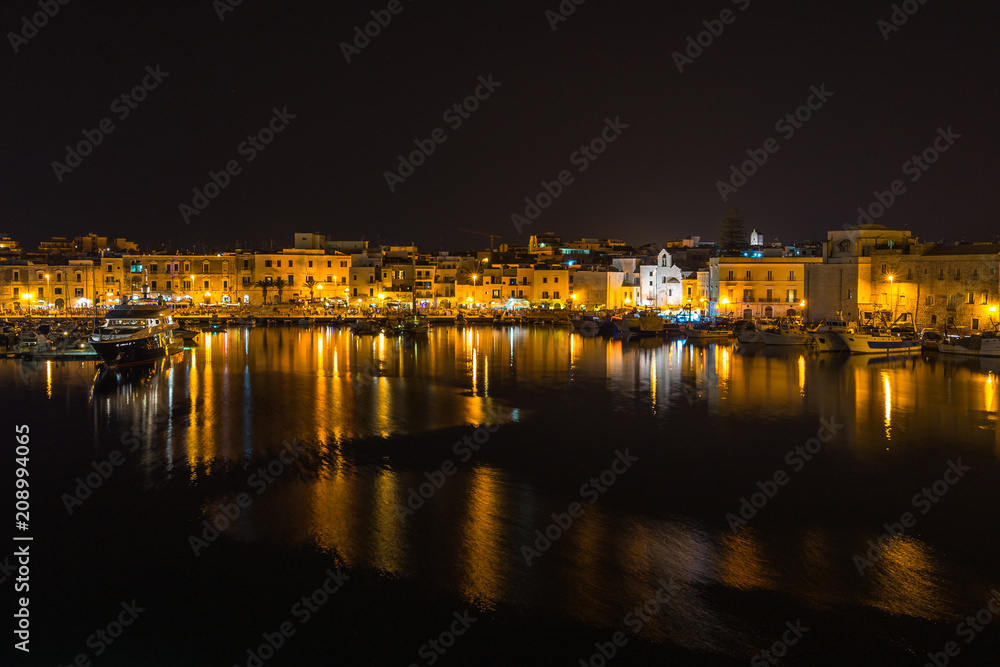 Night view of Trani waterfront and port, Apulia, Italy