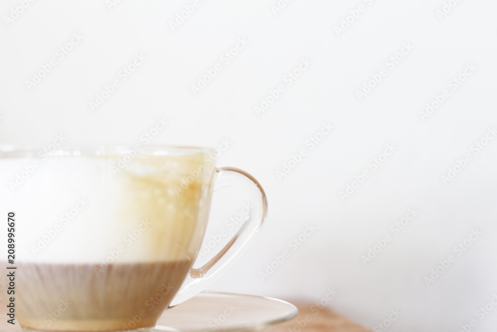 Cup of coffee with milk on wooden Cup of coffee with milk on wooden