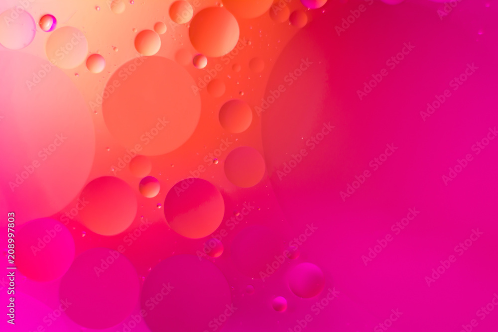 the interaction of water and oil, oil bubbles of various sizes on the water surface, colorful abstract macro background the interaction of water and oil, oil bubbles of various sizes on the water surface, colorful abstract macro background