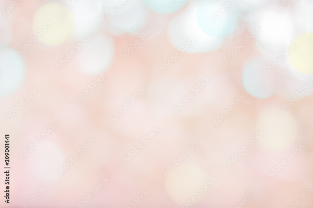 Blurred christmas snow lights on background. Design effect focus happy holiday party glow texture white wall paper pastel bokeh sun star shiny soft plain warm flare blur night light red xmas gray year
