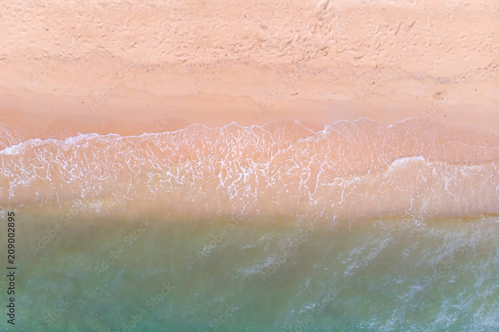 Fototapeta premium Top view of beach in summer, Sea view, Beach in Thailand, captured by drone