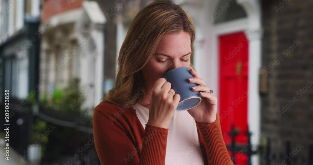 Close up portrait of woman drinking coffee outside, Attractive Caucasian woman smiling and enjoying coffee, 4k Close up portrait of woman drinking coffee outside, Attractive Caucasian woman smiling and enjoying coffee, 4k