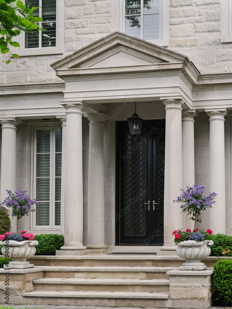 Front door of house with columns Front door of house with columns